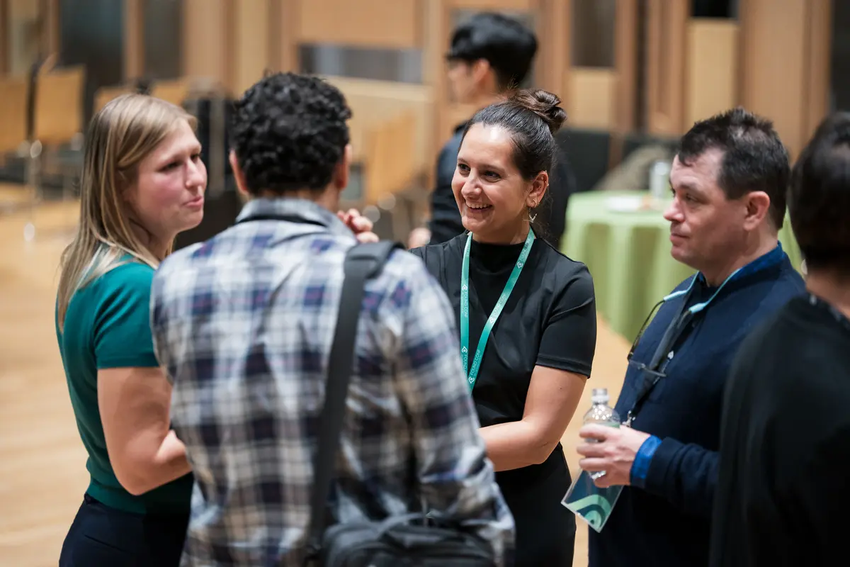 Attendees talking between sessions at FOUND 2025